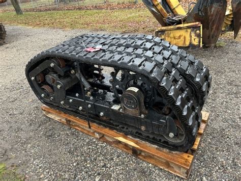 loegering skid steer track parts